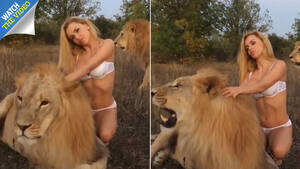 Katya Sambuca Russian Porn Star - Porn star Katya Sambuca poses semi naked straddling two lions that snarl  and snap in discomfort sparking animal rights outrage â€“ The Sun