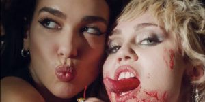 Disney Lesbian Porn Miley Cyrus - Miley Cyrus and Dua Lipa Team Up for Steamy, Trashy 'Prisoner' Video