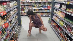 barefoot and naked in supermarket - Girl Squats in the Store without Panties - Tnaflix.com, page=3