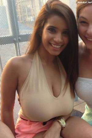 beautiful teen girls breast - This hot babe has tits so big they are basically sitting in her lap! I am  speechless to see such and overdeveloped busty goddess!