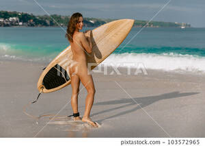 amateur hawaii naked beach pic - Naked woman standing with surfboard on beach... - Stock Photo [103572965] -  PIXTA