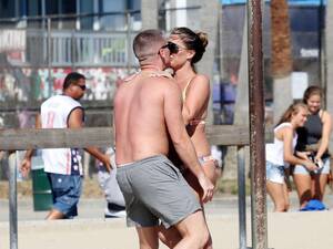 beach nude couples - Danielle Lloyd is pictured looking happier than ever frolicking on the beach  in her bikini with her fiance in LA â€“ The Irish Sun | The Irish Sun