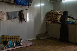 Attack On Titan Slave Porn - A woman from the village of Tojo washing dishes in a refugee camp in  Kurdistan. She was held by the Islamic State from last August until June  and says she ...