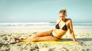 blonde brazilian beach sex - Sexy blonde woman laying on a beach - 4K stock video clip