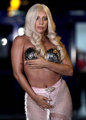 Lady Gag - Lady Gaga arrives in just a thong and sea shell bra at Athens airport -  India Today