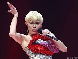 Miley Cyrus Lesbian Porn - Dominican Republic Bans Miley Cyrus for Promoting Lesbian Sex