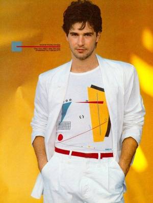 80s Italian Stars Male - 80s White Miami Vice style suit with rolled-up sleeves and geometric T-shirt