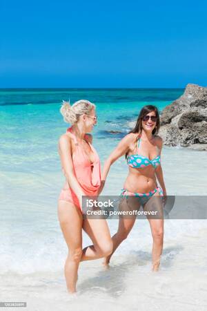 caribbean private beach sex video - Lesbian Couple On The Beach In The Bahamas Caribbean Stock Photo - Download  Image Now - iStock