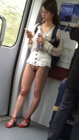 Japanese Voyeurs - Japanese girl pantyless in ultra mini skirt