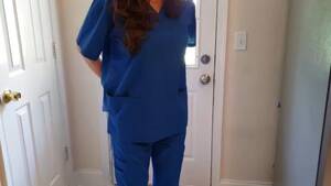 Brunette Nurse In Scrubs - Nurse wetting her scrubs watch online or download