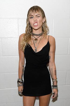 Miley Cyrus Backstage Sex Tape - Miley Cyrus' Pixies Tattoo: See the Photos | Billboard