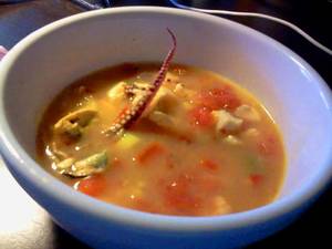 Homemade Tentacle Porn - Homemade Tom Yum Kai spicy Thai seafood soup. Look at the squid tentacle  rising from