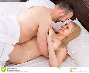 having sex in bed - Young Couple Having Sex Stock Photo - Image: 66840927 jpg 1300x1060