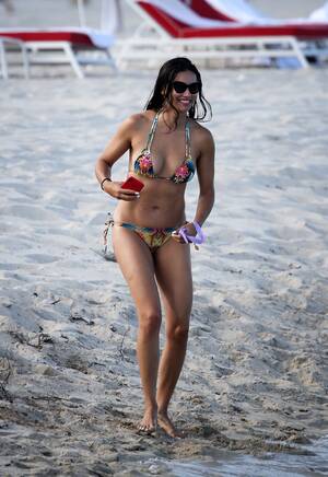candid beach people - Adriana Lima Plays on the Beach in a String Bikini: Photos