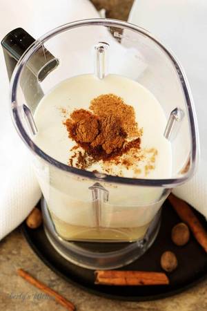 Blender Egg Porn - The condensed and evaporated milks, spices, and egg yolks in a blender.