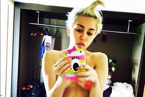 cartoons of miley cyrus naked - Miley Cyrus posts new topless pictures online