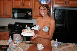 Happy Birthday Sexy Girl - Enjoy the super-sexy nude girl celebrating her birthday in that unusual way  with cake, funny cap and lots of joy!