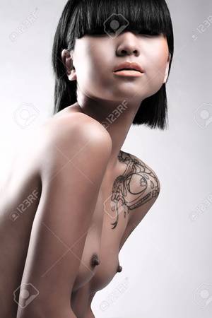black and white asian nudes - Beauty image of nude Asian woman on white studio background Stock Photo -  7012594
