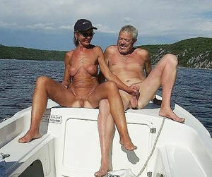 couples public nude - Mature couple hanjob on a boat