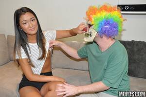asian wig fuck - Scary clown with a stupid wig gets to fuck a tight Asian teen pussy -  IamXXX.com