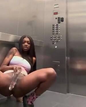 ebony teen squirt - Ebony teen gets caught flooding the elevator - ThisVid.com