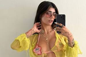 Most Popular Female Porn Stars Mia - Former porn star Mia Khalifa teases fans in teeny-tiny Spongebob bikini and  thanks Scary Spice for fashion inspiration | The Sun