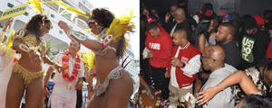 Brazilian Strip Club - Mulatas welcoming a tourist (left) African-American men at a strip club (