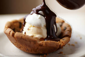 Hot Fudge Porn - Vanilla Ice Cream Sundae with Hot Fudge in a Chewy Chocolate Chip Cookie Cup