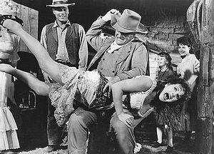 bare bottom spanking mainstream movies - John Wayne giving Maureen O'Hara a hard paddling in McLintock! (1963).