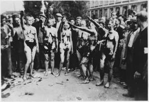 Hitler Camp Forced Sex - Belgian women who had collaborated with the Germans are shaved, tarred and  feathered and forced to give a typical salute.