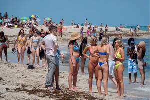 miami beach spring break naked - US air travel hits pandemic high as spring break begins