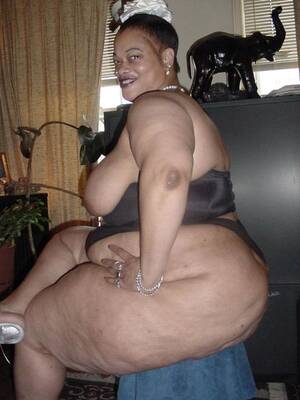 big black fat mama - Very big black mama shows her Damplips porn.