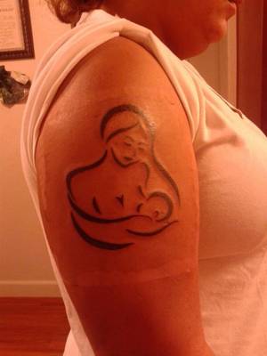 lactating tattooed - Another breastfeeding tattoo idea
