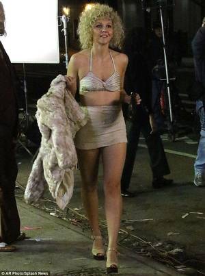 blonde 70s porn - Maggie Gyllenhaal flashes the flesh as she films scenes for The Deuce