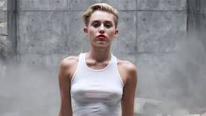 Miley Cyrus Tits Porn - See Miley Cyrus Naked In 'Wrecking Ball' Video - ABC News