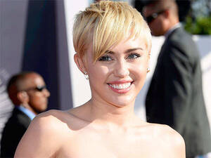 Miley Cyrus Nude Xxx - Miley Cyrus poses naked with bunch of stuffed animals - The Economic Times