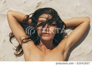 hot naked tanned beach babes - Nude Woman Sunbathing on the Nudist Beach - Stock Photo [82042607] - PIXTA
