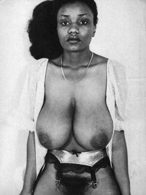 60s black nude - Busty ebony from the 60's poses naked