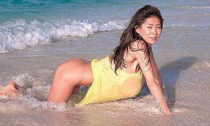 beach spanked bottom - Bottomless: Porn star Minka on a beach.