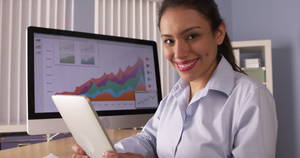 Hispanic Businesswoman Porn - Happy Mexican businesswoman sitting at desk - 4K stock footage clip