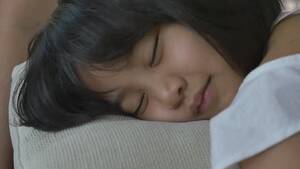 asian sleeping xxx - Happy Little Asian Girl Sleep On Stock Footage Video (100% Royalty-free)  10484126 | Shutterstock