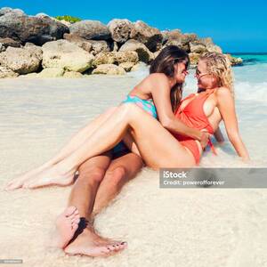 caribbean private beach sex video - Lesbian Couple On The Beach In The Bahamas Caribbean Stock Photo - Download  Image Now - iStock