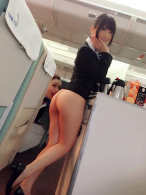 bottomless upskirt ass - Japanese stewardess ass flash in a plane viral pic