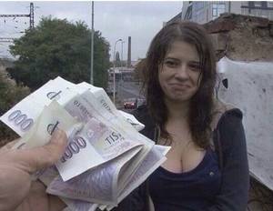 Homeless - Generous young man hands a poor homeless woman some money for the night.