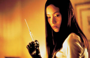 japanese horror movies xxx - woman holding needle from japanese horror movie audition