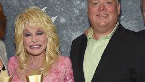 Dolly Parton Porn - Dolly Parton called out by sister for posing with axed publicist Kirt  Webster at CMA Awards