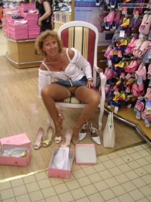 milf upskirt shopping - Pantyless cougar at the shoe store