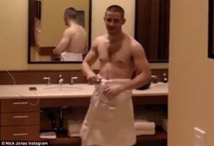 Nick Jonas Nude Porn - Nick Jonas shows off his abs during an episode of Last Year Was Complicated  | Daily Mail Online