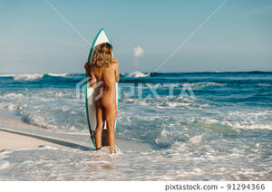 beach nude girls - Naked surf girl with surfboard standing on... - Stock Photo [91294366] -  PIXTA