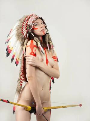 1800 Native American Cosplay Porn - Naked woman in native american costume with feathers Stock Photo by  Â©artrotozwork 502712598